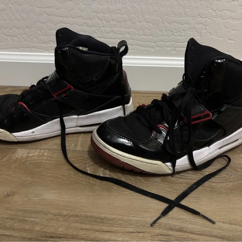 Jordan Black Athletic Sneakers with Red Accent